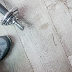 Fitness objects isolated on wooden background. Gray Sneakers, dumbbells and water bottle. Active, healthy lifestyle, sport, fitness, and objects concept. More of my photos and videos Adobe Stock:http://bit.ly/3RqlciK More of my photos and videos Shutterstock: https://www.shutterstock.com/g/ALEKSANDRBERDYUGIN My email: bermix999@gmail.com